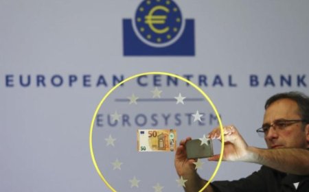 European markets mostly down a day after ECB rate cut; Munich Re soars