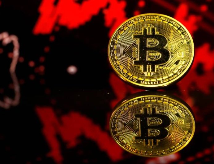 Bitcoin continues slide that’s roiling markets, threatens to break below $80,000