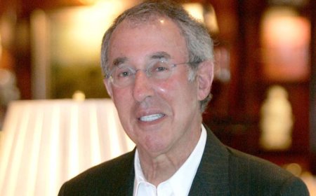 Billionaire fund manager Ron Baron praises beaten-up financial stock whose new CEO he compares to Jamie Dimon